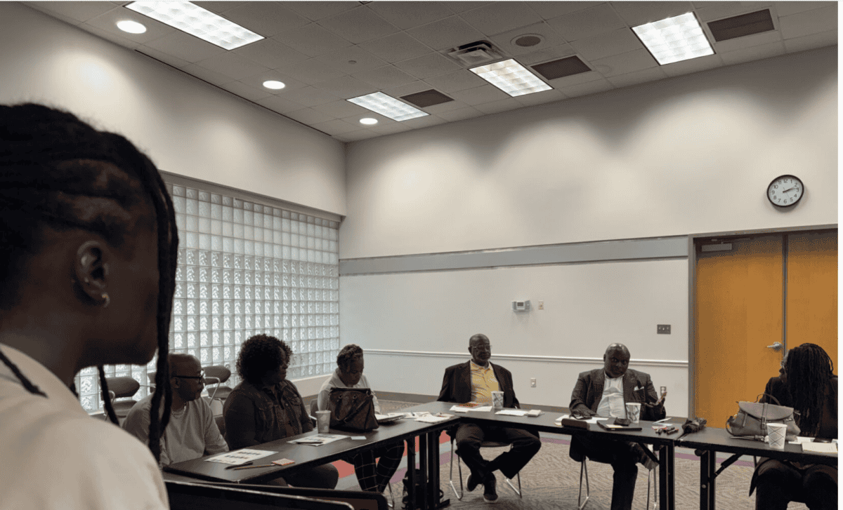 Dr. Cassandra Jean looks over workshop participants